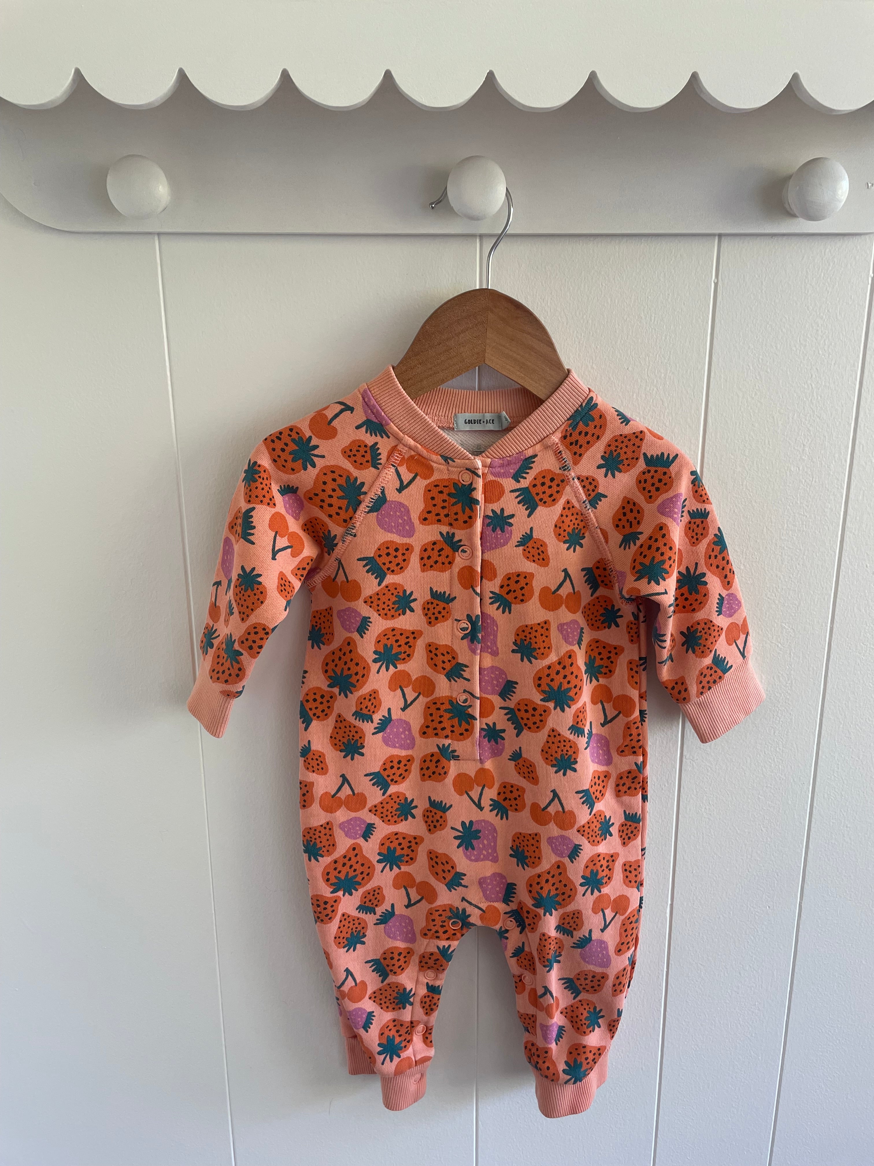 GOLDIE + ACE ONESIE